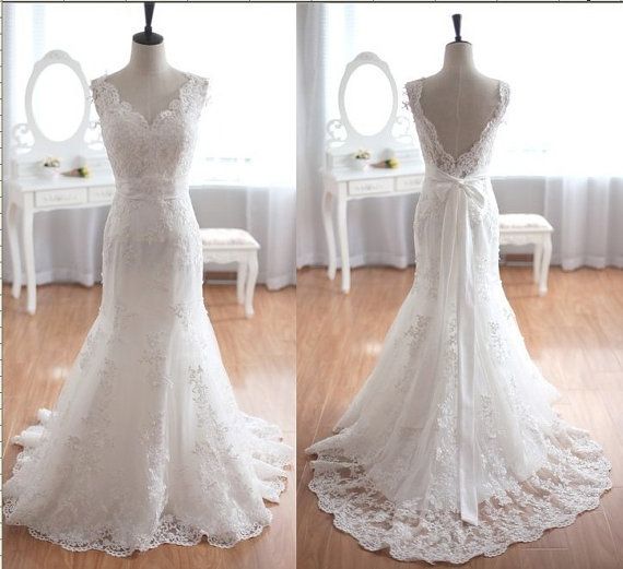 Sleeveless V-neck Lace Mermaid Wedding Dress Featuring V-back And Sweep Train