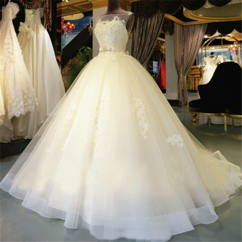 Lace Appliques Bateau Neck Sleeveless Floor Length Tulle Wedding Gown Featuring Bow Accent Belt