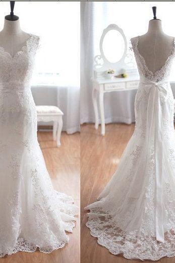 Sleeveless V-neck Lace Mermaid Wedding Dress Featuring V Back And Train
